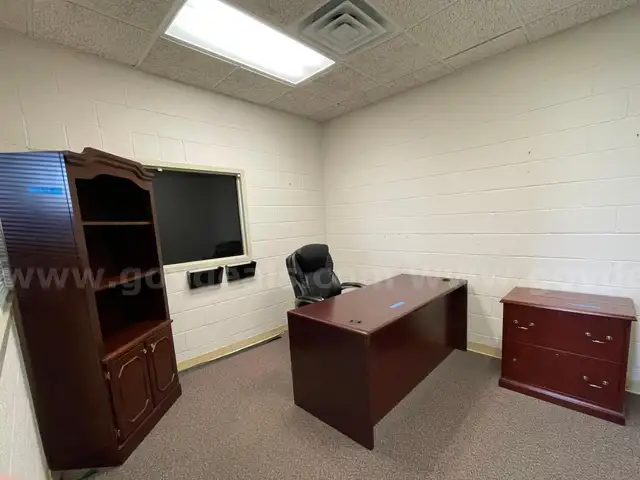 Lot containing one complete office suite.