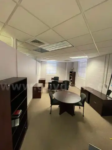 Lot containing: Office furniture lot featuring red mahogany desks, bookcases, file cabinet, conference table, credenza.