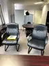 Lot Containing office furniture with round table and assorted office seating.