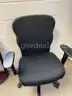 Lot Containing office furniture with round table and assorted office seating.