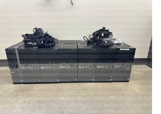 LOT OF COMPUTERS AND ASSORTED CABLES