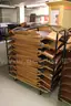 (400)Padded Folding Chairs on (25)Rolling Racks