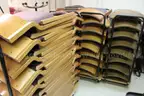 (400)Padded Folding Chairs on (25)Rolling Racks