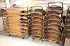 (400)Padded Folding Chairs on (25)Rolling Racks