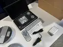 Lot of various cameras, consumer electronics, networking routers, photography equipment