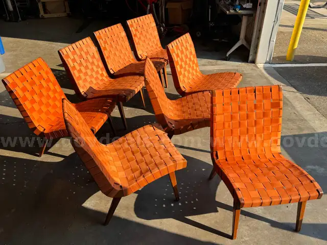 Eight Chairs, wood frame with woven straps.
