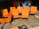 Eight Chairs, wood frame with woven straps.