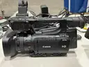 Four video cameras and assorted cables