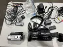 Four video cameras and assorted cables