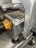 1 Hobart slicer, 1 Hobart mixer, with bowls and lids, with stand