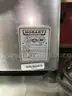 1 Hobart slicer, 1 Hobart mixer, with bowls and lids, with stand