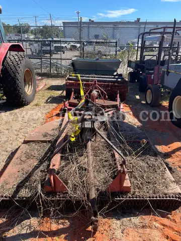 (3)  Assorted mowing equipment