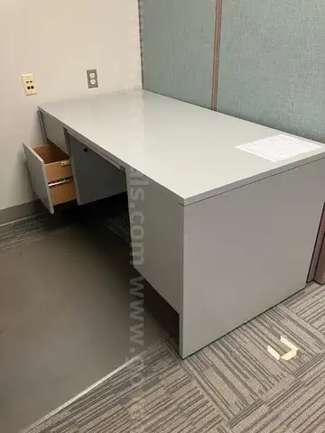 Lot of cubicle stations, desks, and plant stand