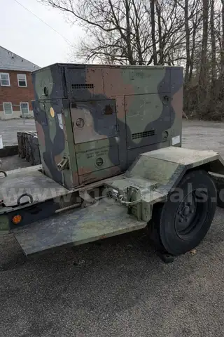 MILITARY GENERATOR ON TRAILER  SOLD AS IS