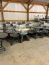 1 lot of approximately 65 plastic student desks with attached chairs