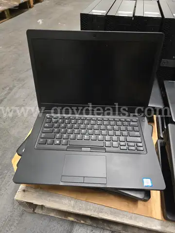 Lot of 17 Dell Desktops, 16 Dell Laptops, and 17 Dell Monitors, plus accessories.