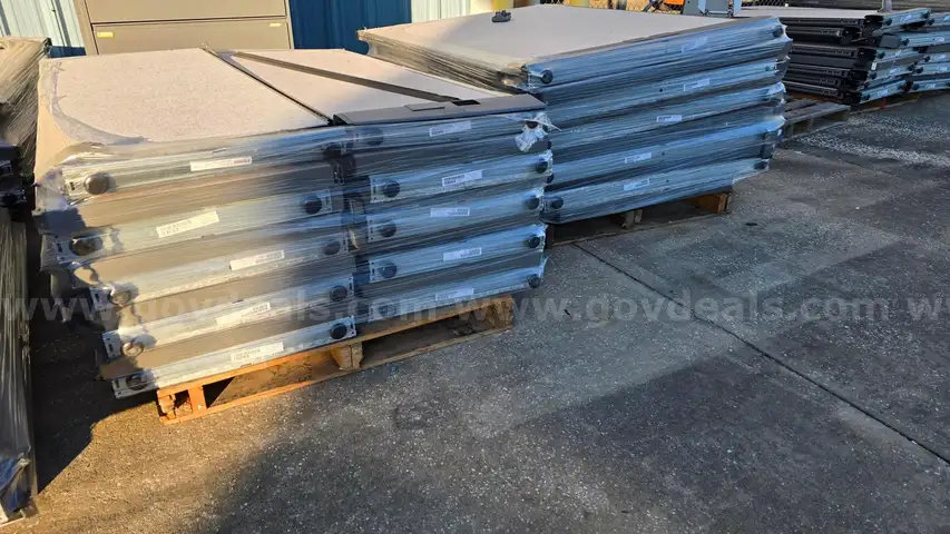 Lot of 13 pallets of Herman Miller Systems Furniture pieces and parts