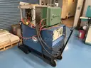 1 Miller CP-250TS DC GMAW/MIG welder, with Cobra brand wire feeder and Dynaflux cooler.