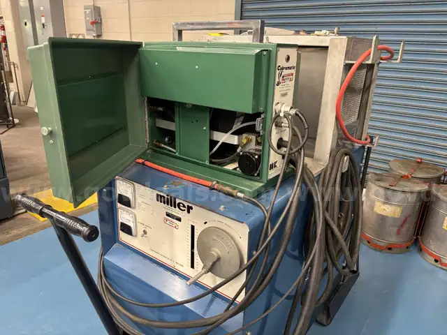 1 Miller CP-250TS DC GMAW/MIG welder, with Cobra brand wire feeder and Dynaflux cooler.
