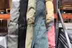 (4) Rolled Fabric Rugs and (1) Assortment of Rods &#x2013; Multi-Color