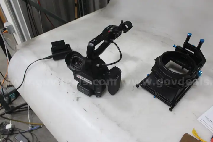 Canon EOS C100 MK II w/ accompanying Equipment