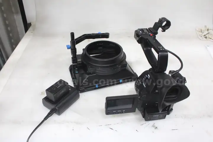 Canon EOS C100 MK II w/ accompanying Equipment