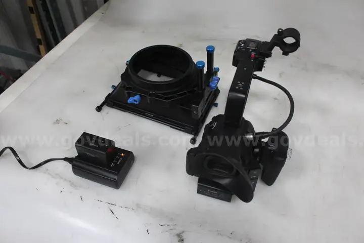 Canon EOS C100 MK II w/ accompanying Equipment
