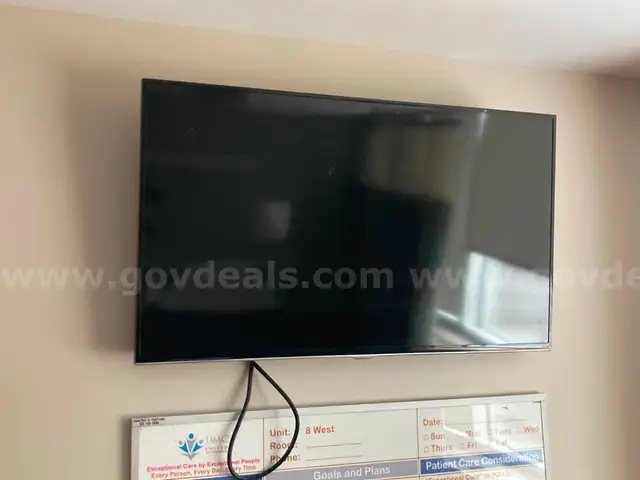 Samsung 40inch Flat Screen Smart HDTVs - all mounted to wall - lot of 6