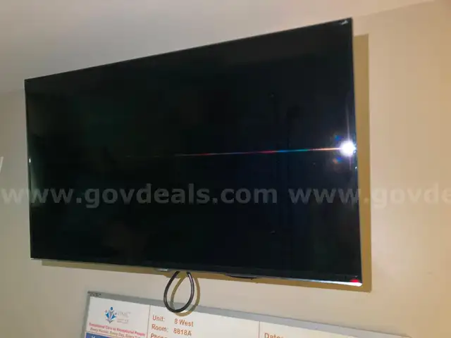 Samsung 40inch Flat Screen Smart HDTVs - all mounted to wall - lot of 6