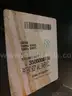 Padded reclining chair on wheels
