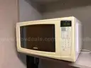 Lot of 12 household microwaves