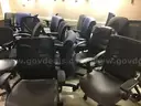 Lot of 26 rolling office chairs and 2 stools