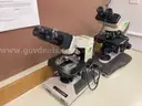 Lot of 9 microscopes and 1 Pentax camera with eyepieces attached