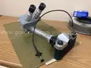 Lot of 9 microscopes and 1 Pentax camera with eyepieces attached