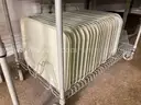 Lot of cafeteria trays, pans, plastic dishwasher trays, small plates