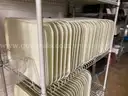 Lot of cafeteria trays, pans, plastic dishwasher trays, small plates