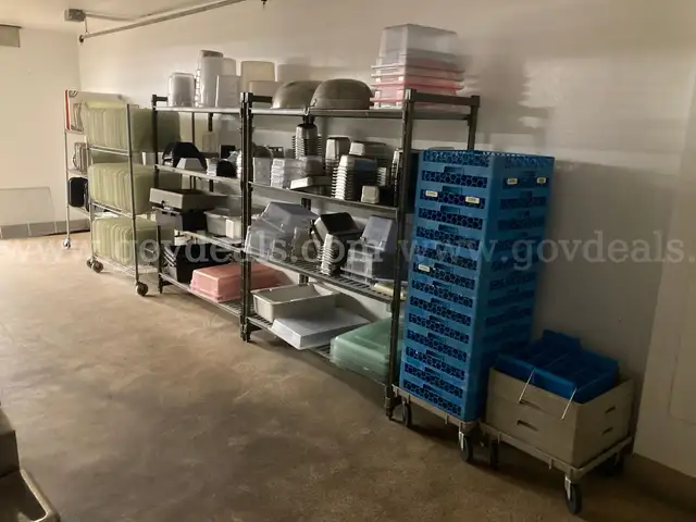 Lot of cafeteria trays, pans, plastic dishwasher trays, small plates