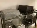 Lot of cafeteria trays, pans, plastic dishwasher trays, small plates