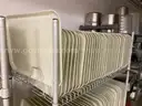 Lot of cafeteria trays, pans, plastic dishwasher trays, small plates
