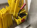 Lot of 21 Wet Floor Signs and 1 Mop Bucket