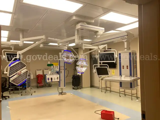 Lot of 2 Operating Room Power Supply Units, 2 Surgical Lights, and 3 Image Stream Surgical Monitors, more