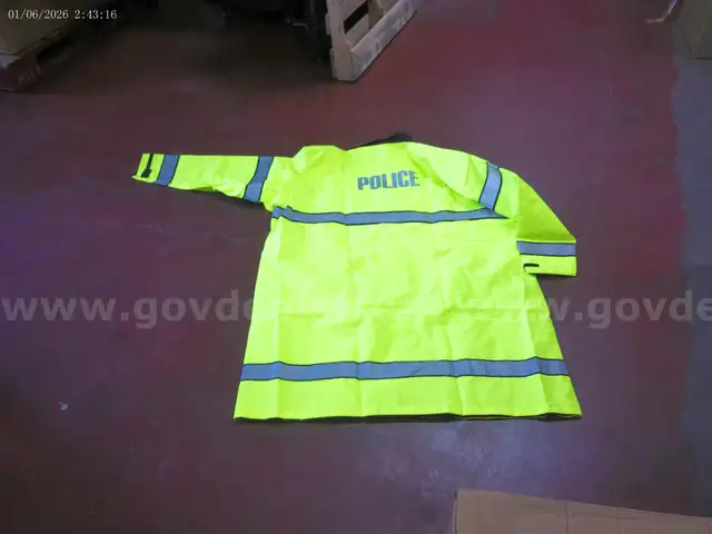 DEFENDER REVERSIBLE RAINCOAT - 100 UNITS