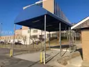 Large carport - approx 16x24ft - with light fixtures and 2 electrical cord reels