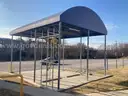 Large carport - approx 16x24ft - with light fixtures and 2 electrical cord reels
