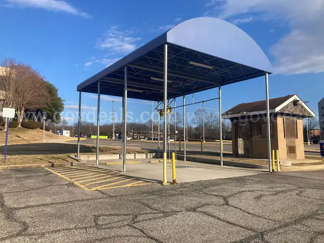 Large carport - approx 16x24ft - with light fixtures and 2 electrical cord reels