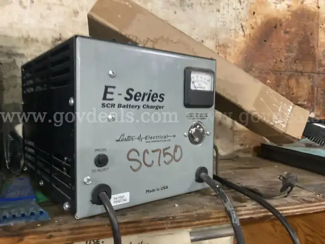 Lot of 4 battery chargers for janitorial equipment