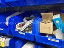 Spare parts for repair of medical equip - includes metal shelves with plastic bins