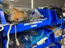 Spare parts for repair of medical equip - includes metal shelves with plastic bins