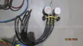 Air conditioning gauges and vacuum pump