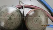 Air conditioning gauges and vacuum pump